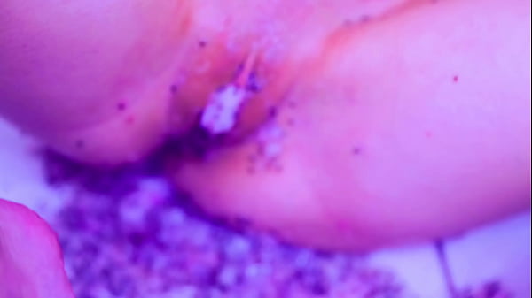 Bare toes crushing juicy fruit