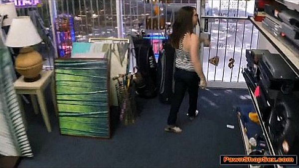 Petite brunette babe gives the Pawnshop owner a blowjob 
