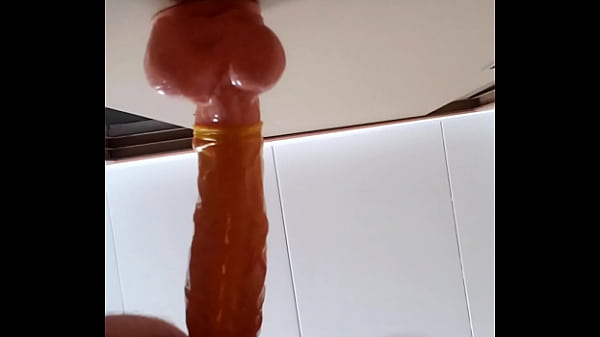 Backing up on a thick dildo 