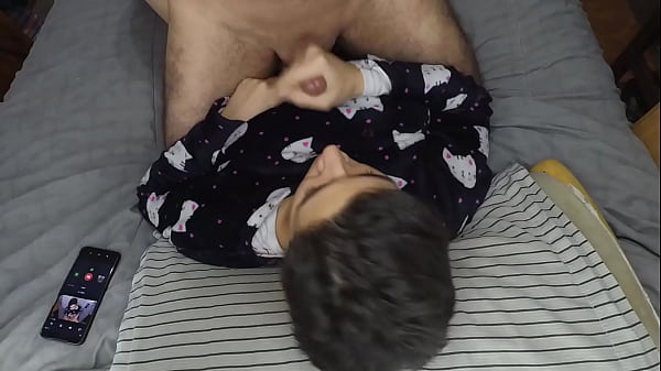 She gives me a handjob on her pajamas and swallows the prize