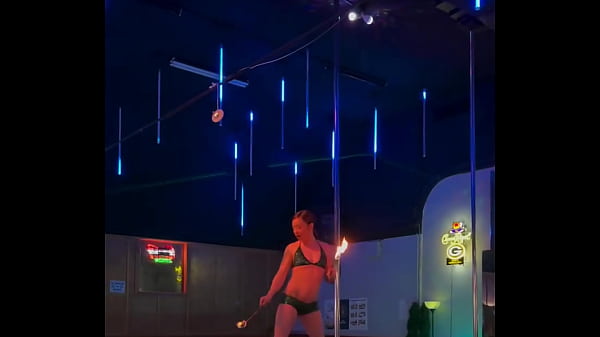 Destiny mae dancing and playing with fire on stage at the strip club 
