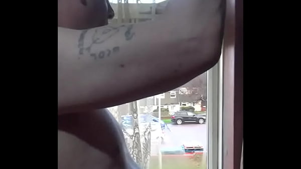 swallowing my own pee by the window naked 