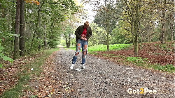 Got2pee Brings Another Desperately Peeing Girl In The Park Path - Featuring Big Puddle thumbnail