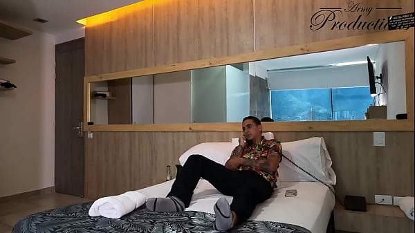 The cleaning girl helps him with his new toy by sucking him