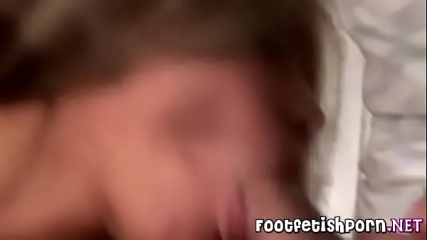 Jenny gives a foot job 