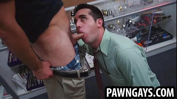 Amateur hunk sucking on a cock at the pawn shop
