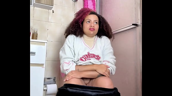 Chubby girl can't stop farting in toilet with belly ache 