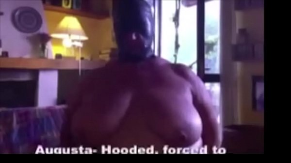 Augusta- A slut wife is chairbound, hooded, smoking with a long holder, then gagged and fucked 