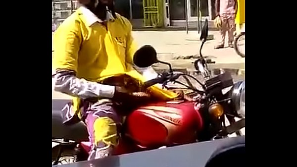Motorbiker stroking his meat 