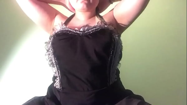 woman in maid costume plays with nipples 