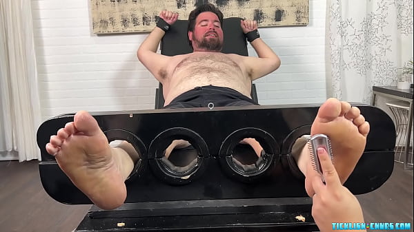 Cute Nemo Set Up To Tickle On A Bondage Bed 