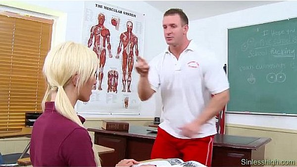 Sports coach with teen after lessons