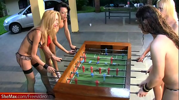 T-girls strip down lingerie and stockings playing foosball 