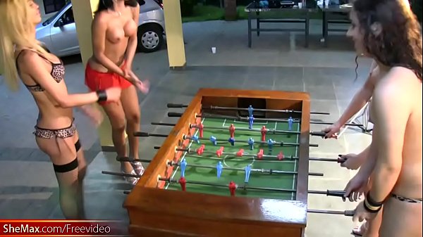 Play MP4 - T-girls strip down lingerie and stockings playing foosball