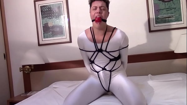 Adonis In Bondage Ballgagged In Lycra Jumpsuit Gagged thumbnail