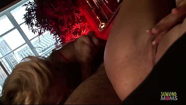 The men and brunettes_get a visit from_the blonde milf_who they welcome with anal group sex