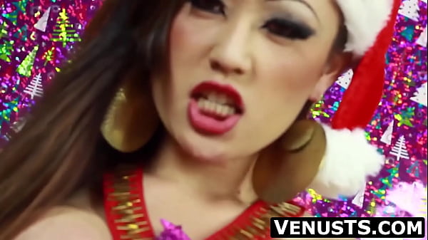 Asian tranny Venus Luxx is a very naughty Santa'_s little helper jerking off her big cock solo as a Christmas gift to herself.