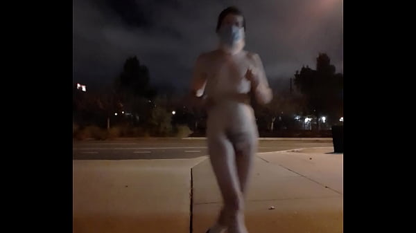 Streaking a street under a full moon