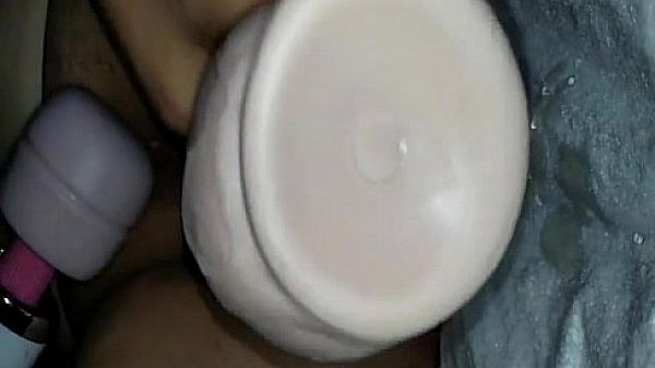 Amateur slut pounding her pussy with a couple of hot toys 