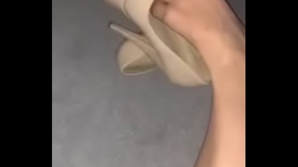 Foot teasing with my sexy heels 