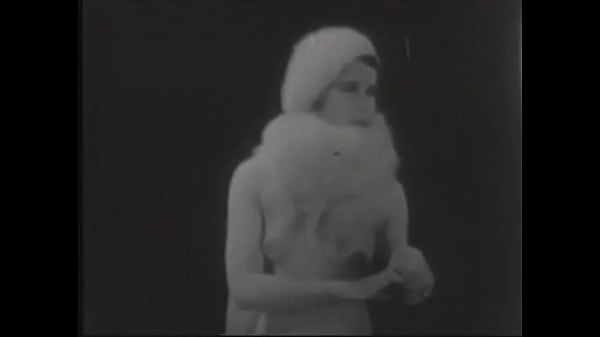 Meet Miss Summer Hours as she poses for the camera with a black back 