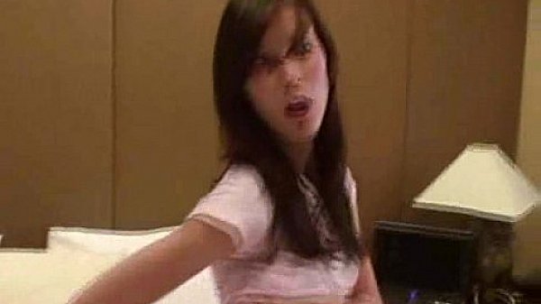 Thin teen fingers herself