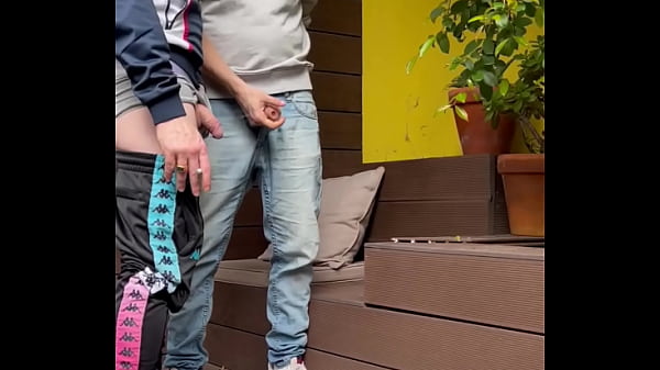 2 boys try to pee in a glass (one gets hard )