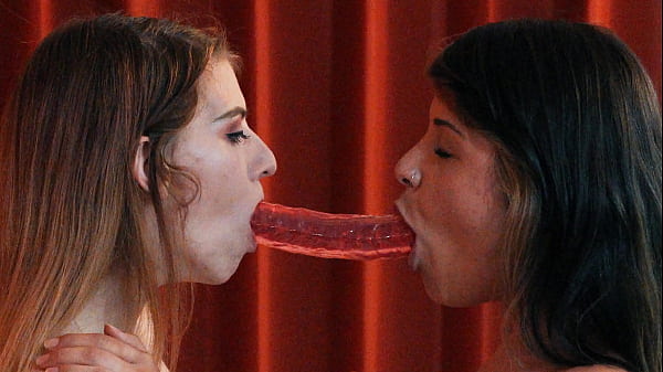 Two Lesbo Sluts Share A Dildo thumbnail