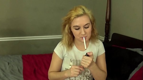 Play MP4 - Blonde Girl Chain Smoking on Her Bed