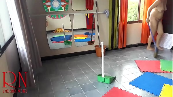 Nudist maid cleans the yoga room. A naked cleaner cleans mirrors, sweeps and mops_the floor. scene1