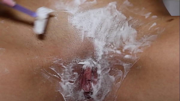 Beautiful blonde with natural tits shaves pussy pov 