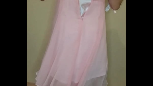 Man dressed in white wedding lingerie and jerks a hot load of cum. 