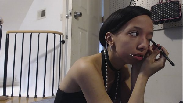 Morning makeup routine with a sexy goth girl