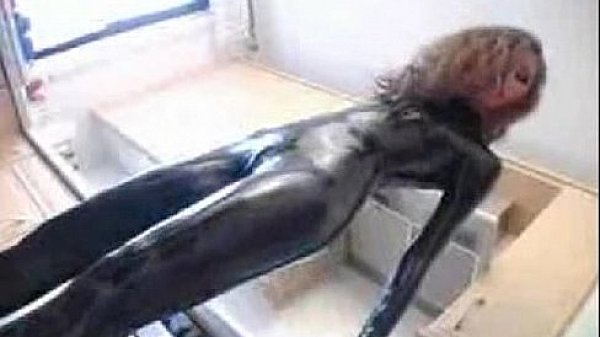 Hot Girl in Black Latex and High Heels 