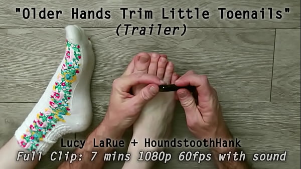 Older hands trim little toenails 