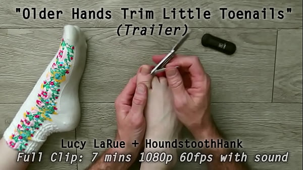 Older hands trim little toenails