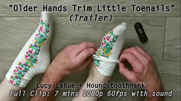 Older hands trim little toenails 