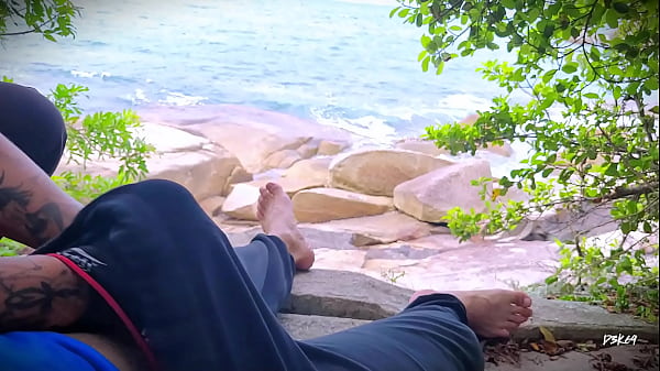 Surprise ejaculation handjob on the beach