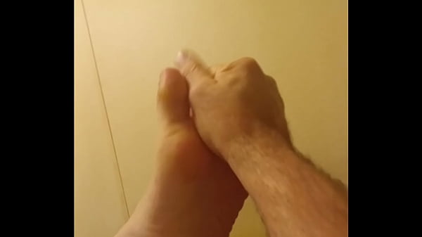 Rubbing lotion onto my sexy foot