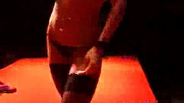 Two strippers dildo on stage 