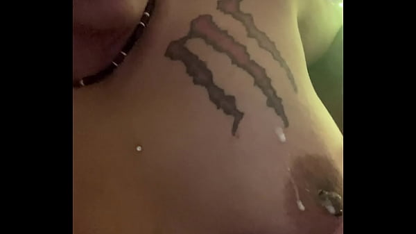 What is she doing to her tits 