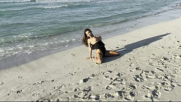 Sexy Monika Fox In Black Bodysuit On Beach thumbnail