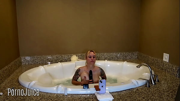 Petite blonde plays with huge bbc toy in the bath 