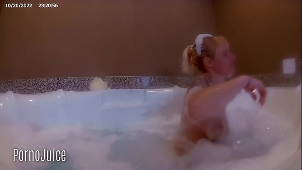 Petite blonde plays with huge bbc toy in the bath 