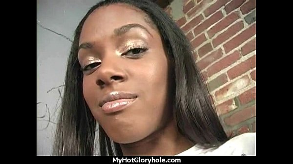 Ebony teen shows offher blowjob skills at gloryhole25
