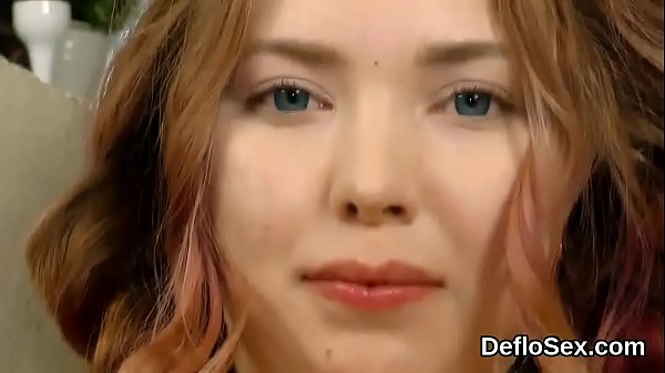 Lovely semi nude hottie tickles her opened hymen in closeup