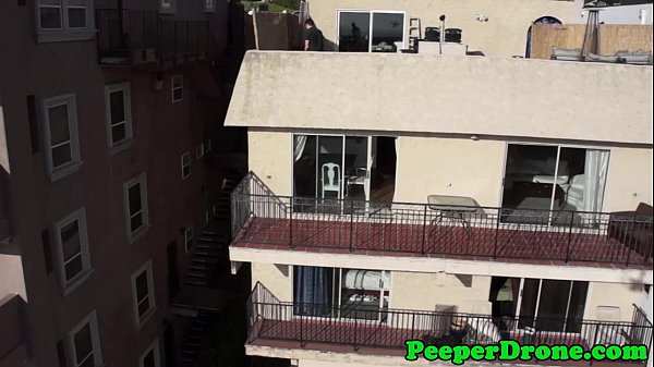 Rooftop sex filmedby drone