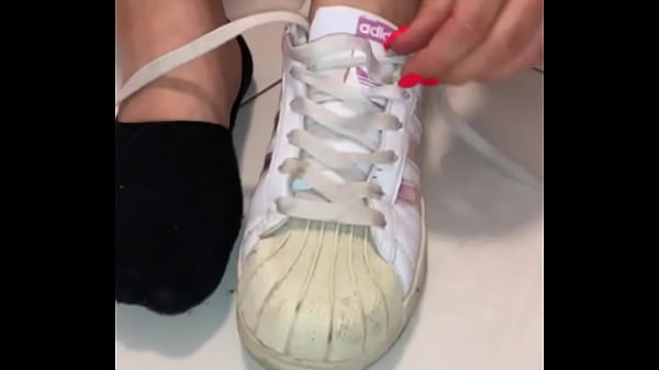 I take off my dirty shoes and dirty socks and clean my feet