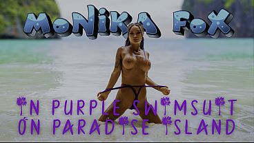 Sexy Monika Fox In Purple Swimsuit On Paradise Island thumbnail