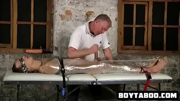 Saran wrapped hunk hunk get his cock tied and tugged